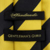 Black-and-Gold-Striped-Branded-Tie-from-Gentlemansguru.com