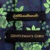 Green-Floral-Branded-Tie-from-Gentlemansguru.com